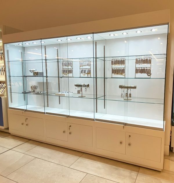 glass display cabinet in white with storage.