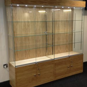 Trophy cabinet with storage to base