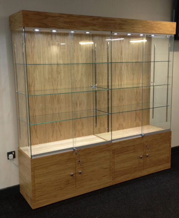Trophy cabinet with storage to base