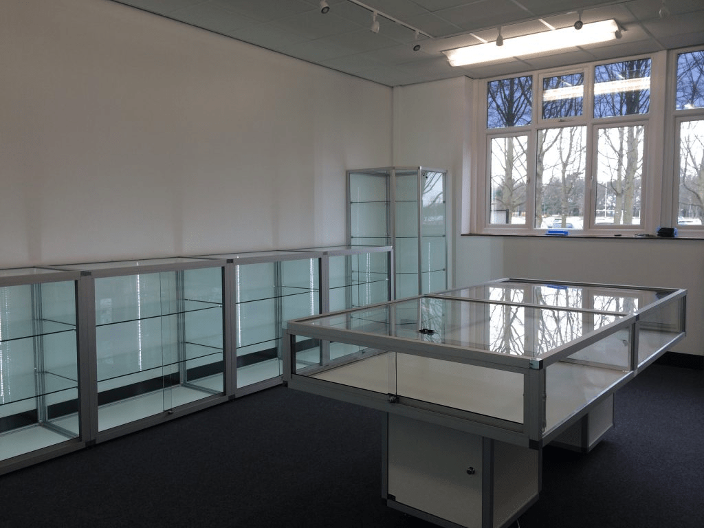 Museum showcase display with glass cabinets and windows