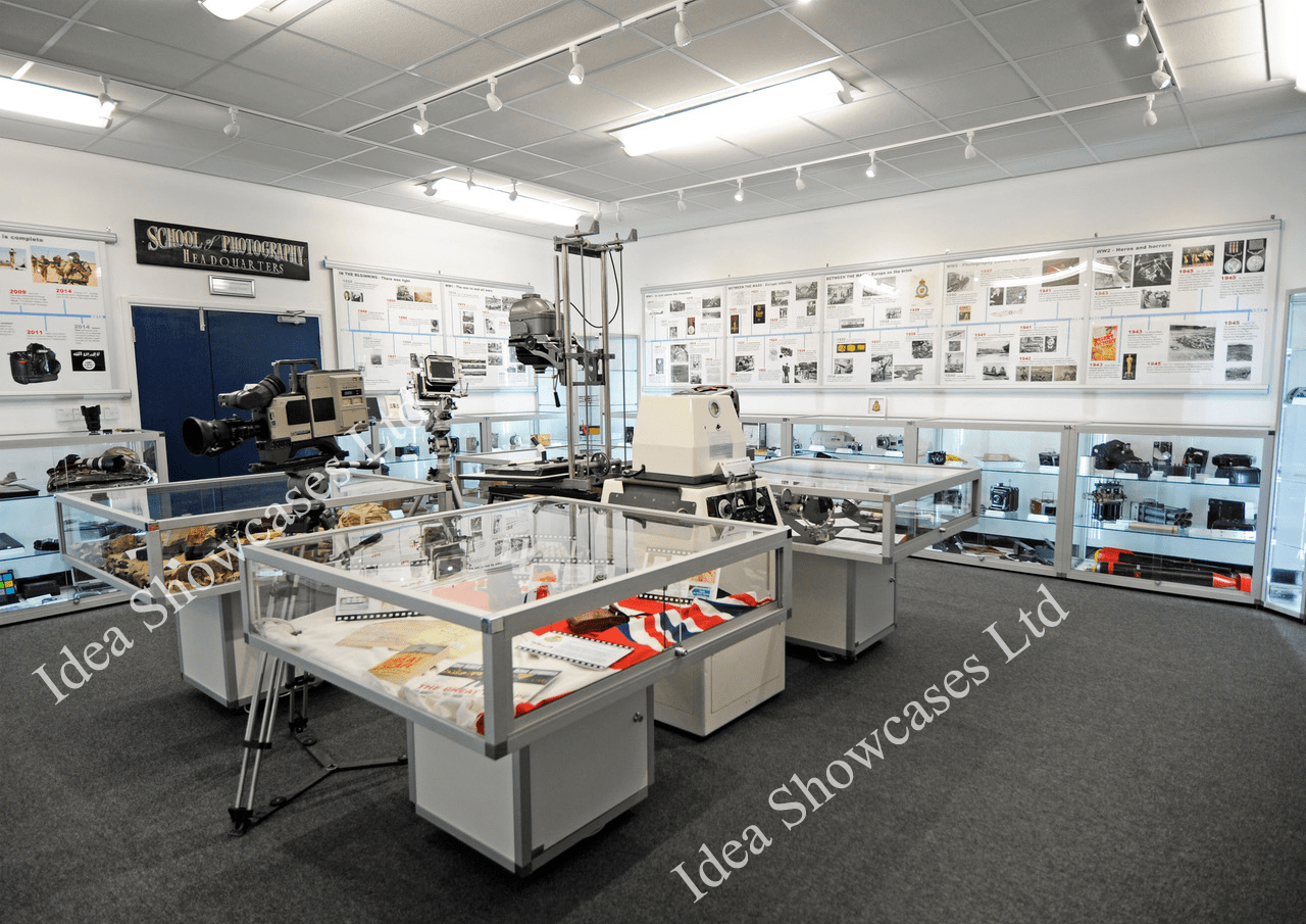 Museum showcase with camera equipment and display cases